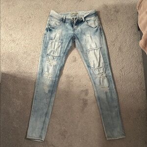 Trendy Distressed Women's Skinny Jeans in Light Blue